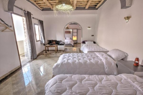 Отель Auberge Miguirne Chez Ali  Tamellalt